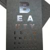 Gloss black foil debossed